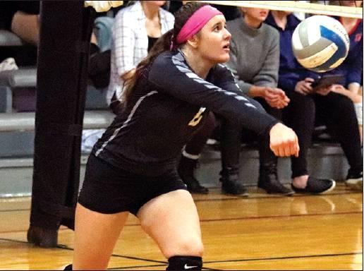 Kaylee Pastorek bumps the ball during the matchup against the Spartans Monday night in Crystal. More pictures from Monday nights game and Senior night next week in VNV. VNV Photo by Lesa Van Camp