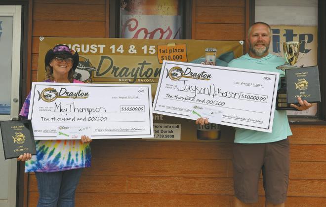 May Thompson of East Grand Forks and Jayson Ackerson of West Fargo were all smiles after reeling in first place at the 2026 Drayton Catfish Capital Tournament. The Team 3 partners finished with a two-day total of 76.68 pounds and took home $10,000. Photo by Rebecca Davis