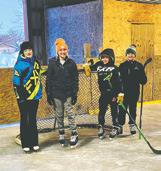 Hailey Uggerud, Reegan Aasand, Rylan Nore, and Jaxon Woinarowicz enjoyed some time on the ice after school on Monday, Jan. 9. Photo by Hilary Nowatzki.