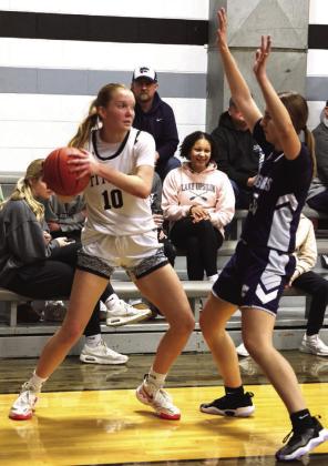 Easton Larson squares off against a North Prairie defender.