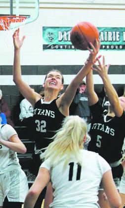 Elizabeth Fedje fights for control of the rebound. Photo by Jamie Rarick