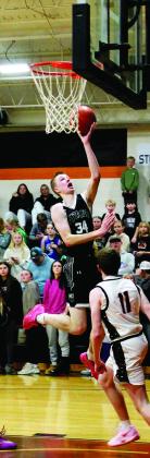 Jack Langerud slices through Cavalier’s defense for the layup. Photo by Jamie Rarick