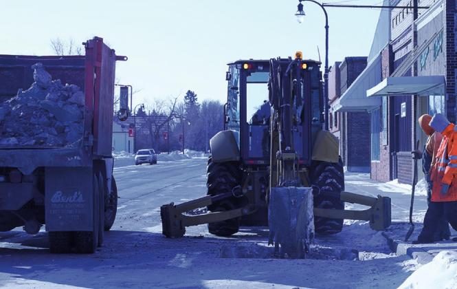 Once the concrete was removed the process of digging could start so the repairs could be made in the frigid tempuratures last week. VNV Photo by Lesa Van Camp