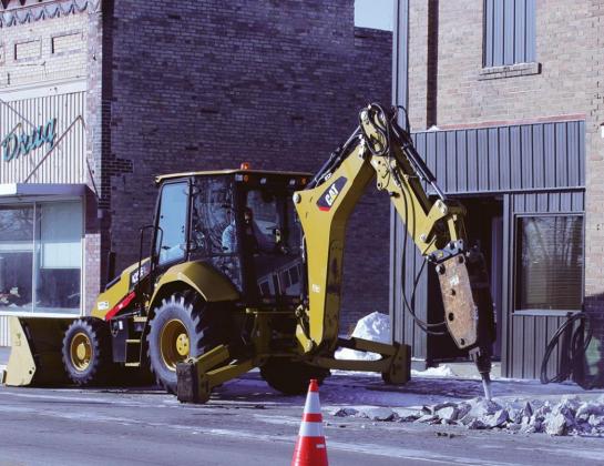 A jackhammer was needed to begin the process of digging up the street to find the broken water line last week. VNV photo by Lesa Van Camp