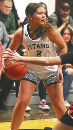Brooke Gullickson looks for an outlet in action in the play-in game. Photo by Lyle Van Camp.