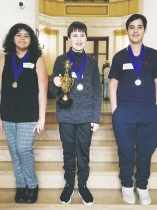 Drayton students (pictured from left to right) Khloe Hart, Loki Sylskar, and Lucas De Souza participated in the Pembina County Spelling Bee in Cavalier last week. Sylskar earned 2nd place and qualified for the state competition in Bismarck. Congratulations to all!