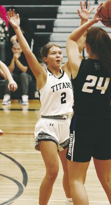 Brooke Gullickson defends Hatton-Northwood's Kennison Azure. Photo by Lyle Van Camp.