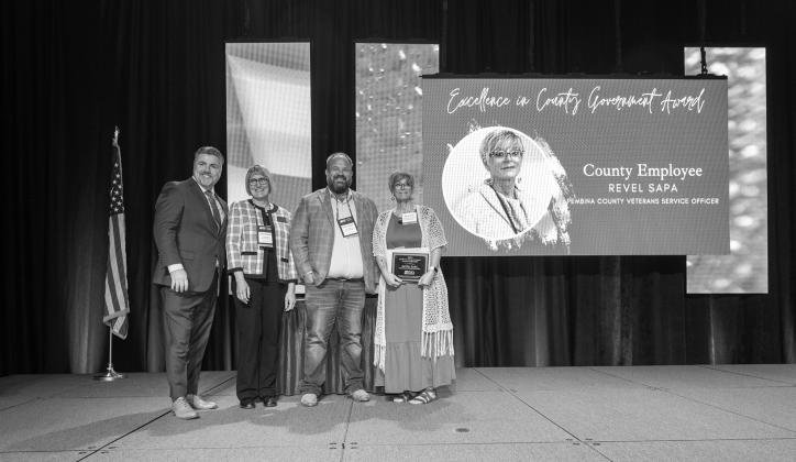 NACo Executive Director Aaron Birst, NDACo President Jayme Tenneson, NDCCA President Joan Hollekim, EICG Award Recipient Revel Sapa, Pembina County Veterans Services Officer. Submitted photo