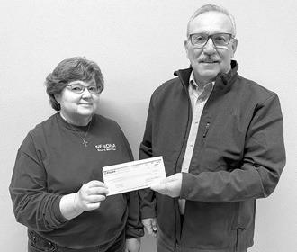 NENDHA board member Bonnie Danielson and Polar board member Gordon Johnson.