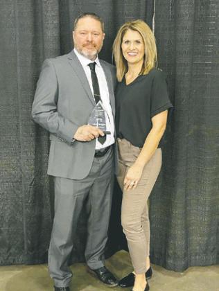 Pembina County North wrestling coach Shon Horgan was inducted into the North Dakota Wrestling Coaches Hall of Fame during the state wrestling tournament in Fargo. Horgan was voted into the hall of fame by his peers. The induction ceremony was held on Saturday, Feb. 18. Horgan is pictured with his wife, LaRae, following the ceremony. Submitted photo.