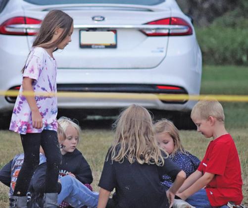 A group of youngsters play their own game of Duck, Duck, Goose during the football game Friday night. VNV photo by Lesa Van Camp