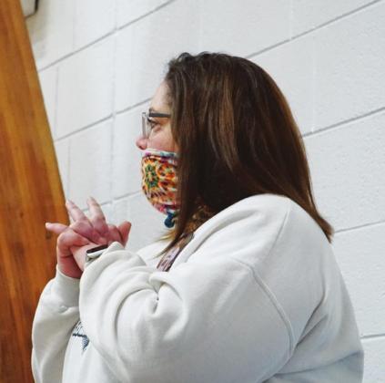 Nervous mom, Lindsay Pollestad keeps an eye on the action at Hope on Tuesday evening of last week. VNV photo by Lyle Van Camp