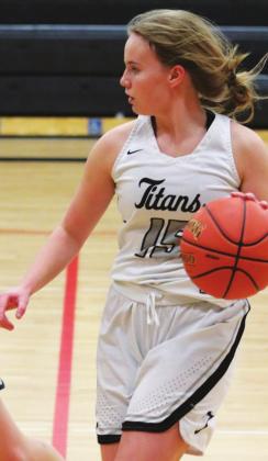 Aleah Pokrzywinski brings the ball up the court in action against North Border. VNV photo by Lyle Van Camp