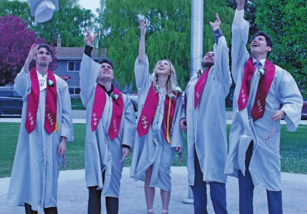 Pictured right: One last picture of the Class of 2020 in front of the flagpole as the toss their caps in the air to celebrate together. Left to right: Todd Anderson, Trey Cummings, Sharon Hatloy, Austin Hermanson, and Christian Larson. VNV Photo by Lesa Van Camp