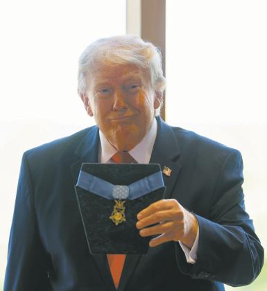 President Donald Trump poses with Theodore Roosevelt’s Medal of Honor during the dedication of the Theodore Roosevelt Presidential Library on July 1, 2026, in Medora, North Dakota. Photo by Tasos Katopodis/Getty Images for Theodore Roosevelt Presidential Library
