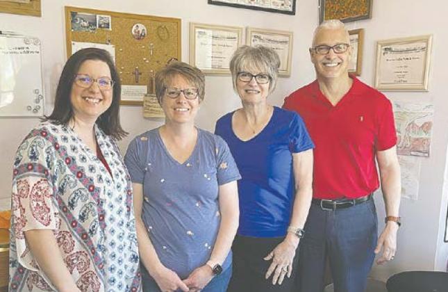 Pictured are Andrea Johnston, Lesa Van Camp, Diane Simmons, and Bob Simmons.