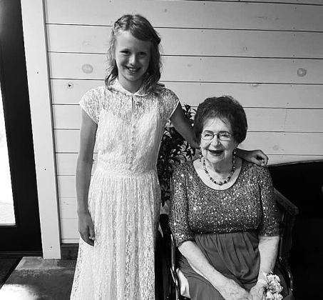 Here’s a picture of Jaycie and Joanie Carlson with Jaycie wearing Joanie’s 1950 Wedding Dress.