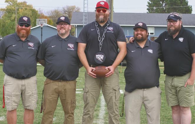 The Bombers coaching staff; from the right, Matt Rarick, Kyle Truesdell, Nathan Foster, Raven Smith, and Joe Jones. Photo by Lyle Van Camp