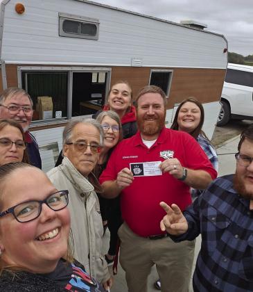 A group of school staff enjoy a coffee of their choice at Fill Your Cup Coffee Company. This was the first event organized by the new PTO group. Photo by Jamie Rarick, courtesy of Bomber’s PTO.