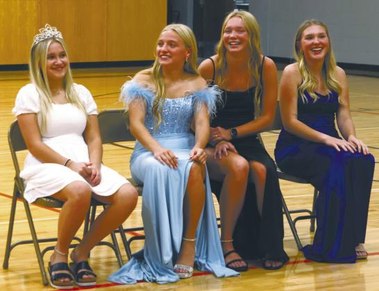 Claire Thompson, Reese Ferring, Easton Larson, and Rylee Maurstad laugh at a remark during introductions at the 2024-2025 coronation held Monday afternoon. Photo by Lyle Van Camp