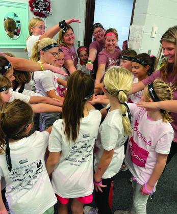 Before and after each session, and the 5K, the BIO Girls placed their hands together, then lifted them up to their air shouting, “In and out, I count!”