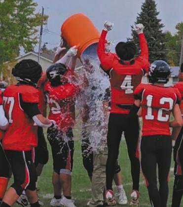 Bombers celebrating after their win. Photo by Jamie Rarick