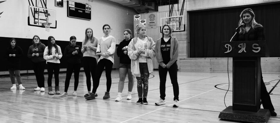 Volleyball, from left to right: Kiara Aasand, Isabella Douville, Brooke Gullickson, Claire Thompson, Easton Larson, Elizabeth Fedje, Aleah Pokrzywinski, Alyssa Hoyles, Greta Burrell, Coach Fedje. Photo by Lyle Van Camp.