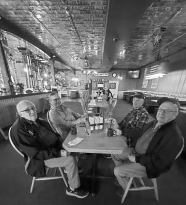 Four bible study friends at the Frog Pond in Halma, Dale Johnston, Bob Kline, Derall Aipperspach, and Clint Van Camp. Submitted Photo.