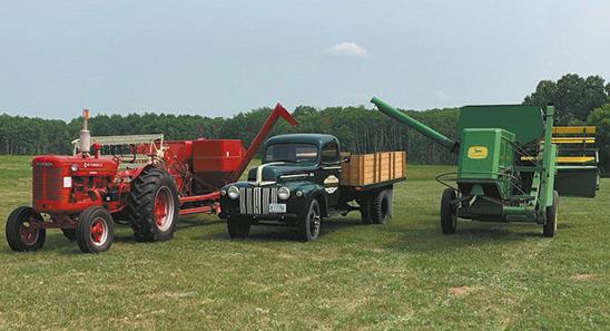 Combines and trucks are ready for the 31st Annual Pioneer Machinery Show at the Pembina County Museum Grounds. Submitted photo