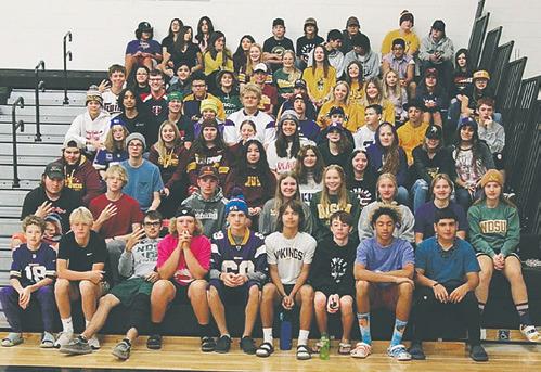 Students sport their hats in the gym on a CASH Day.