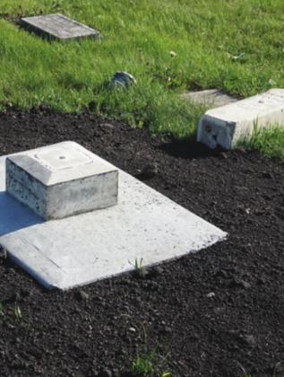 The base of one of the older markers has been rebuilt and is just waiting for the marker to be remounted. VNV Photo by Lyle Van Camp