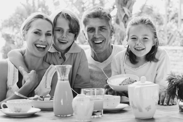 The benefits of eating together as a family apply whether the meals are at home or out and about.