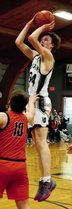Going vertical, DVE senior Jack Langerud makes the shot over Cavalier defender Carson Stauffenecker. Photo by Jamie Rarick