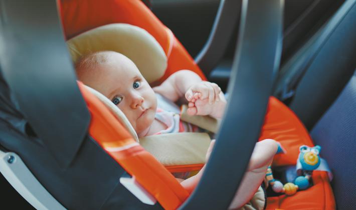 In North Dakota, 70% of child car seats are not being used properly. Get yours checked at the numerous sites in the state offering car seat checkup clinics. Stock photo
