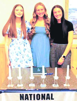 Members of the National Junior Honor Society: Hailey Uggerud, Reegan Aasand, Tess Sehrt. Photo by Jamie Rarick