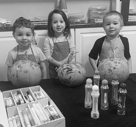 Thank you to Allard Soderfelt for donating pumpkins for the big kids at G &amp;amp; M daycare in Drayton. They had fun decorating them. Pictured are Calvin Helm, Brooklynn Stangeland, and Colton Kerr.