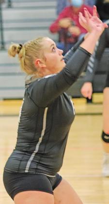 Aliyah Bartels sets the ball for her teammate on Saturday afternoon. VNV Photo by Lesa Van Camp