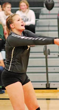 Kasey Stegman calls out to her team mates that shes got the ball in Saturday’s matchup against Larimore in the Drayton gym. VNV Photo by Lesa Van Camp