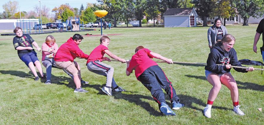 A group of eighth graders play tug of war during the Homecoming events on Friday afternoon to wind down Homecoming week. Photo submitted by Drayton Public School