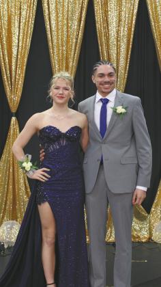 Alyssa Hoyles escorted by Mason Pollestad