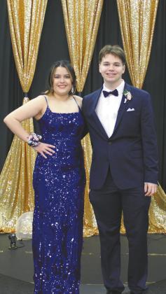Melissa DeSouza escorted by Tayden Markel Photos by Andrea Johnston.