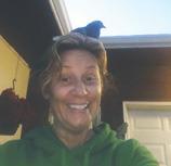 Delilah perched atop Andrea Passa's head. Photo by Andrea Passa.