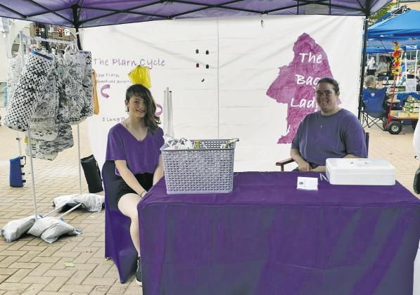The Bag Lady’s first Townsquare farmers market in Grand Forks on June 18. Lindsay Kissee is pictured with her youngest daughter, Stephanie.