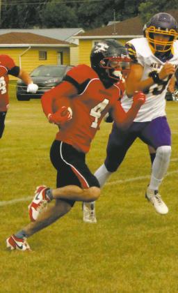 On the opening kick-off, Trypp Castillo returned the ball for a Bomber touchdown. Photo by Jamie Rarick