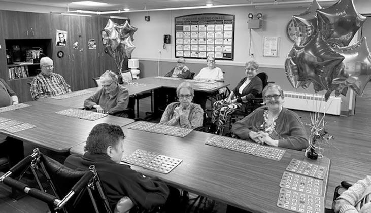Residents pose for a photo during bingo extravaganza. Submitted photo.