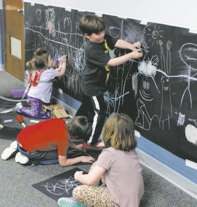 Chalk the halls was a hit at Drayton School's family night. Photo by Jamie Rarick More Family Night pics, page 9