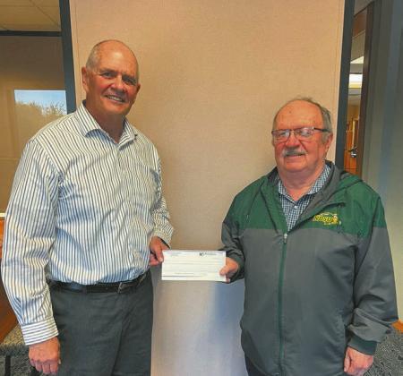 Pete Anderson, KodaBank left, with Andy Duncklee, Drayton Improvements, right. Submitted photo.