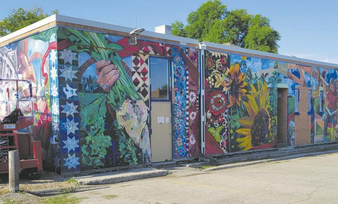 The new mural located on the North and East facing sides of Carnegie Regional Library in Grafton has been taking shape over the past couple of days. Photo by Mike Allen Steinfeldt