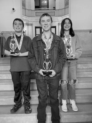 Overall winners from the left: 2nd Place – Hunter Fitzgerald, 1st Place – Caleb Halvorson, and 3rd Place – Milla Fagerholt.