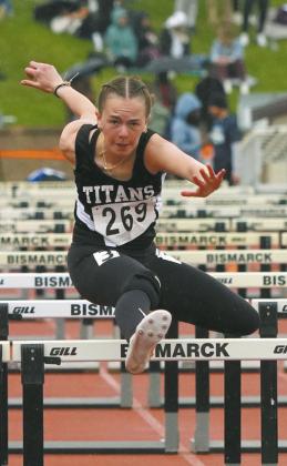 Jocelyn Vold competes in the 100-meter hurdle preliminaries at the Class B State Track Meet. Photo by Larry Stokke